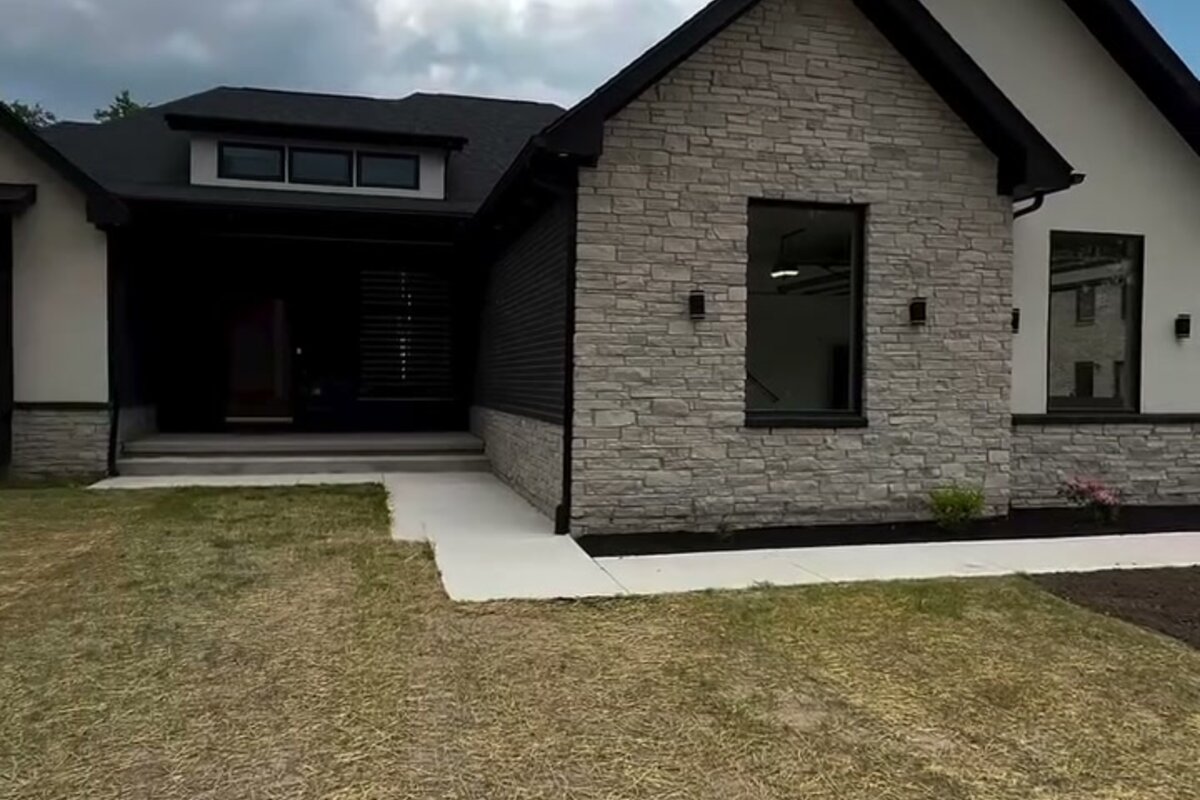 Modern transitional spec home — completed exterior